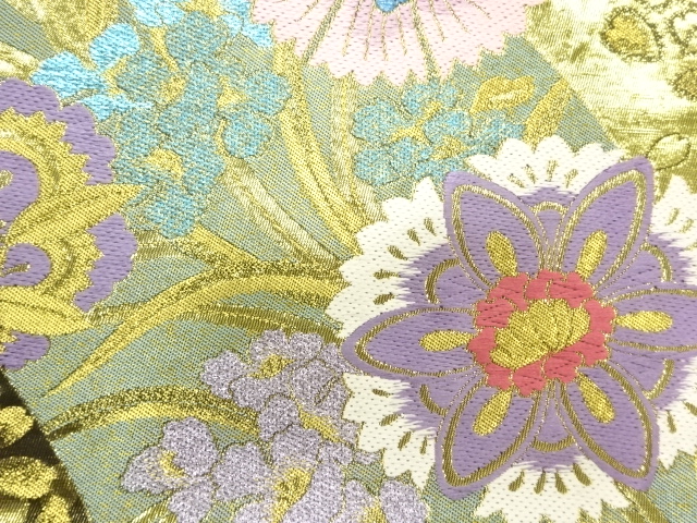  本金唐花模様織出し丸帯